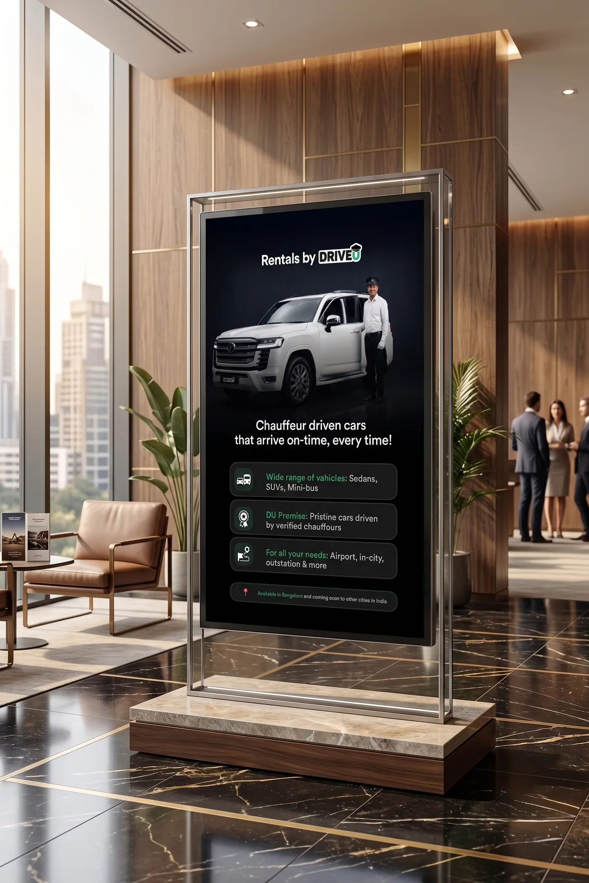 Rentals by DriveU standee in a corporate lobby: chauffeur driven cars that arrive on time, every time